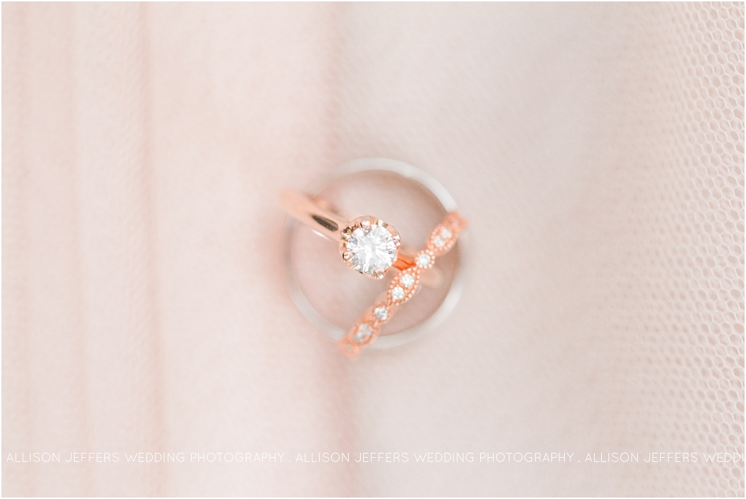 Rose gold engagement ring _a-teal-and-blush-wedding-at-lakeside-pavillion-in-marble-falls-texas-by-allison-jeffers-wedding-photography-austin-wedding-photographer_0002