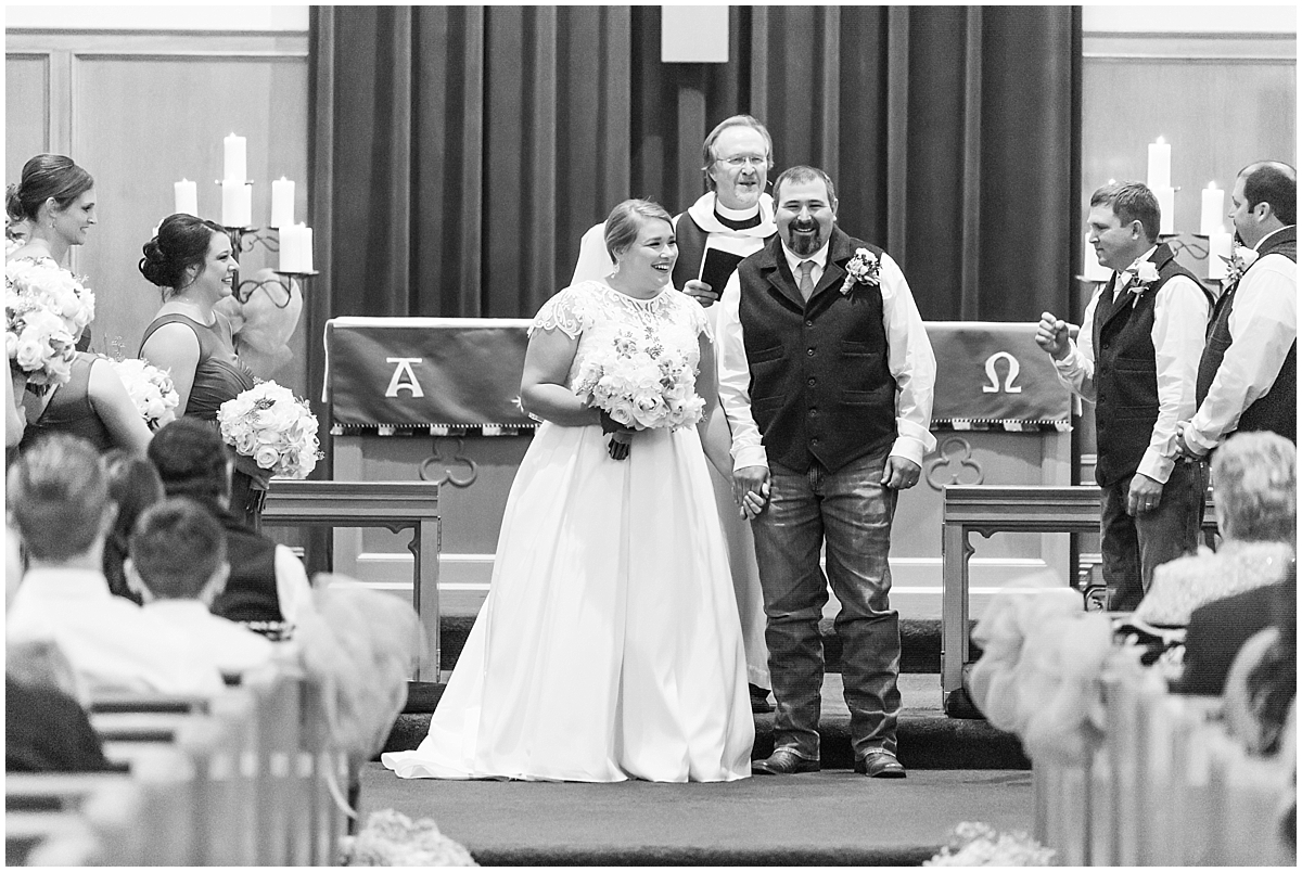 a-charcoal-grey-ivory-burgundy-winter-wedding-at-bethany-lutheran-church-in-fredericksburg-texas-by-allison-jeffers-wedding-photography-fredericksburg-wedding-photographer_0042