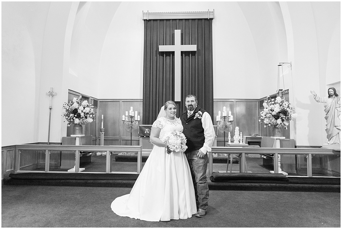 a-charcoal-grey-ivory-burgundy-winter-wedding-at-bethany-lutheran-church-in-fredericksburg-texas-by-allison-jeffers-wedding-photography-fredericksburg-wedding-photographer_0048