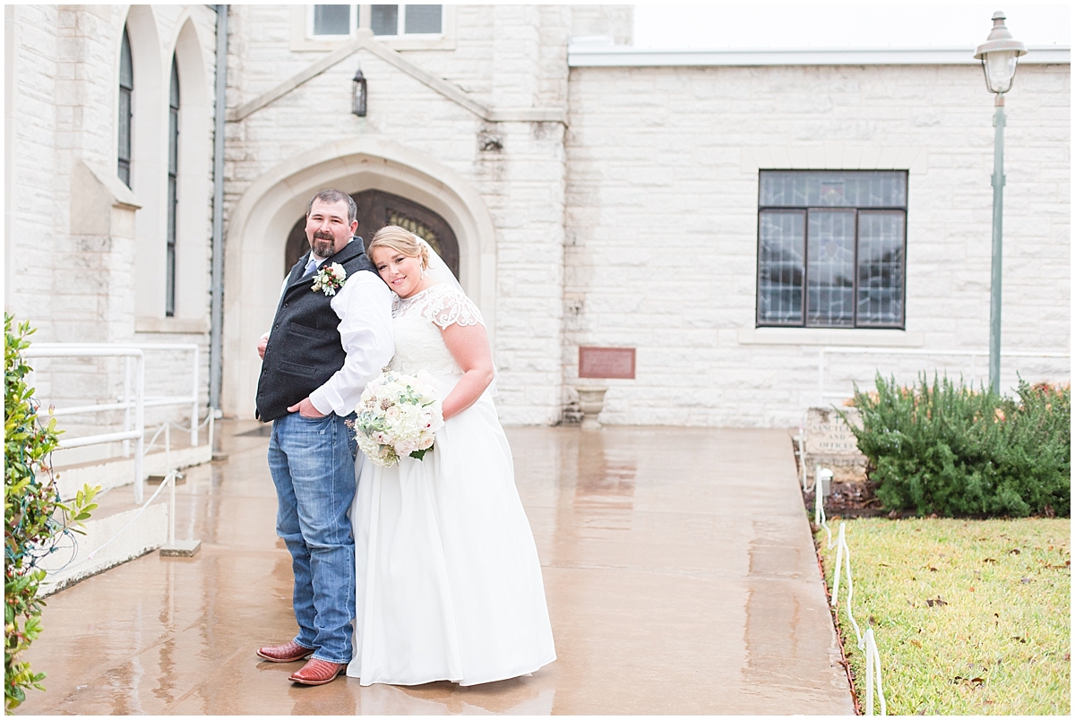 a-charcoal-grey-ivory-burgundy-winter-wedding-at-bethany-lutheran-church-in-fredericksburg-texas-by-allison-jeffers-wedding-photography-fredericksburg-wedding-photographer_0058