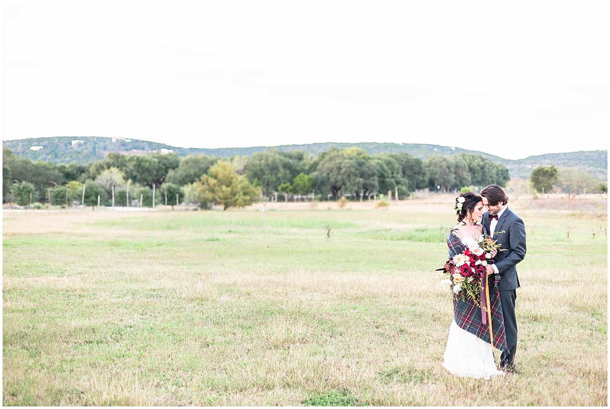 a-fall-wedding-at-montessino-ranch-in-wimberly-texas-featuring-pendleton-plaid-and-a-horse-by-allison-jeffers-wedding-photography_0004