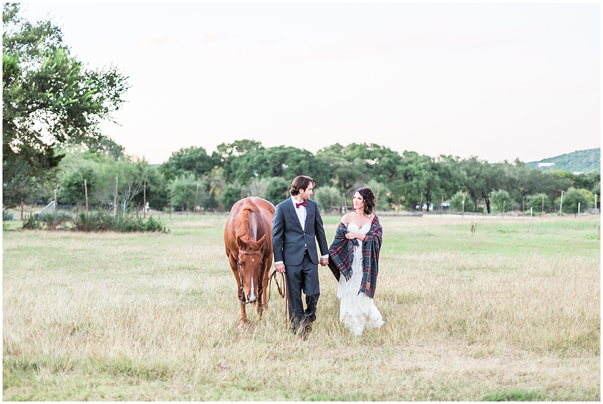 a-fall-wedding-at-montessino-ranch-in-wimberly-texas-featuring-pendleton-plaid-and-a-horse-by-allison-jeffers-wedding-photography_0007