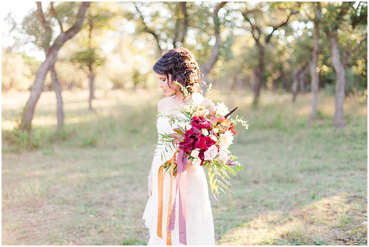 An inspirational fall styled session featuring Pendleton plaid at Montesino Ranch in Wimberly Texas by Allison Jeffers Wedding Photography Dripping Springs Wedding Photographer. gypsy floral austin texas