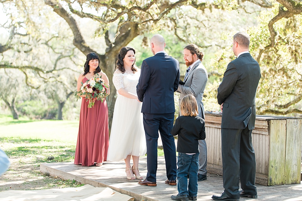 A Modern Sisterdale Dancehall Wedding in Boerne Texas by Allison Jeffers Wedding Photography featuring a sage, burgundy, and pale pink color palette 0021