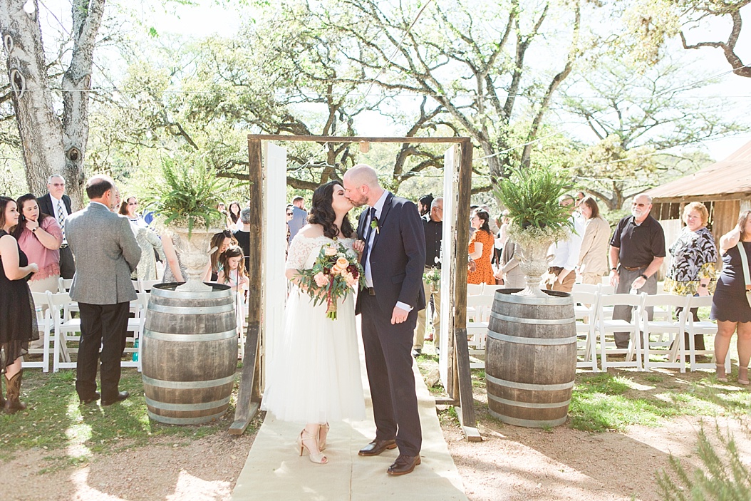 A Modern Sisterdale Dancehall Wedding in Boerne Texas by Allison Jeffers Wedding Photography featuring a sage, burgundy, and pale pink color palette 0031