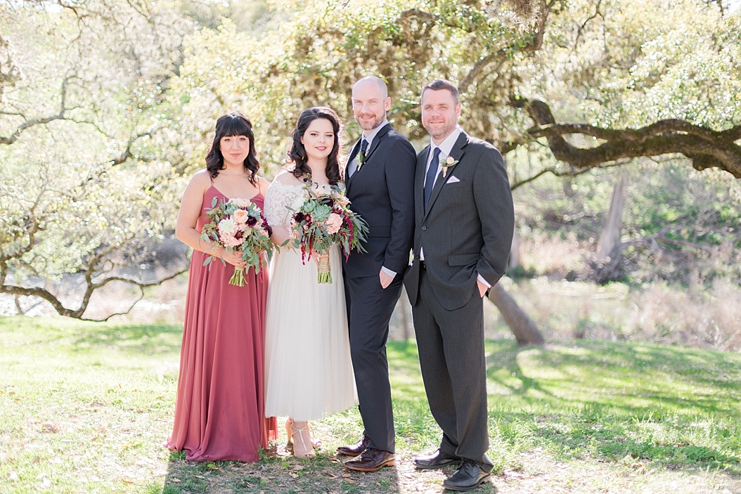 A Modern Sisterdale Dancehall Wedding in Boerne Texas by Allison Jeffers Wedding Photography featuring a sage, burgundy, and pale pink color palette 0039