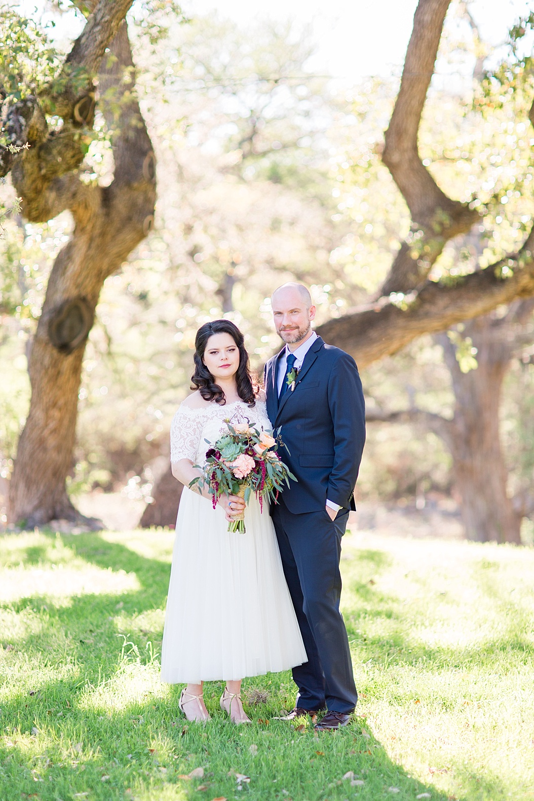 A Modern Sisterdale Dancehall Wedding in Boerne Texas by Allison Jeffers Wedding Photography featuring a sage, burgundy, and pale pink color palette 0042